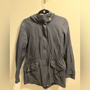 Only water resistant navy jacket with hood. Size M